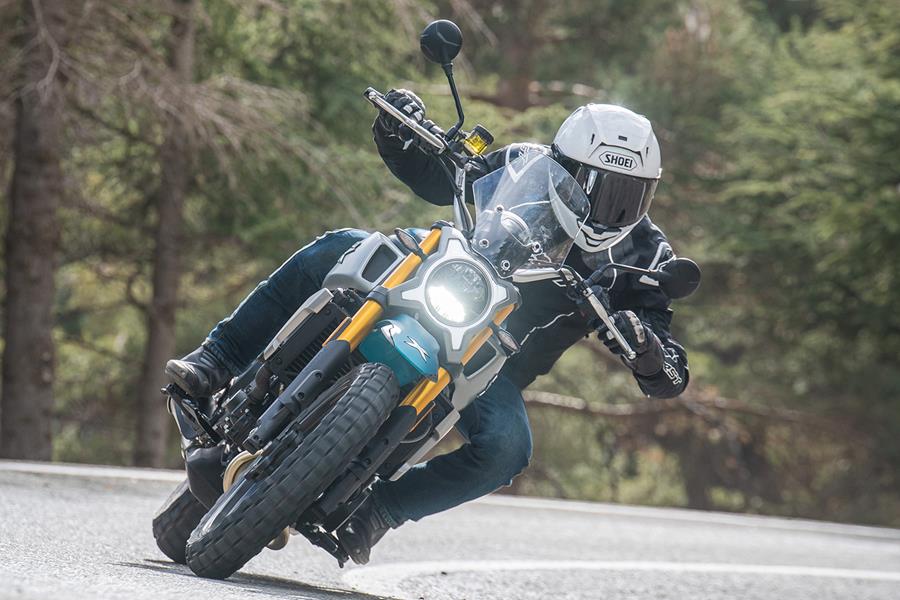 Accelerating out of a corner on the CFMoto 700 CL-X Adventure