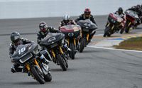 Racers on the track at King of the Baggers